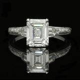 A BEAUTIFUL EMERALD-CUT DIAMOND AND PLATINUM SOLITAIRE RING BY HANCOCKS