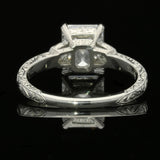 A BEAUTIFUL EMERALD-CUT DIAMOND AND PLATINUM SOLITAIRE RING BY HANCOCKS