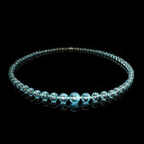 A BEAUTIFUL LONG NECKLACE OF FACETED AQUAMARINE BEADS RETAILED BY THE GOLDSMITHS AND SILVERSMITHS Co., c.1930
