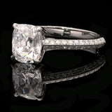 A BEAUTIFUL OLD MINE CUT DIAMOND AND PLATINUM SOLITAIRE RING BY HANCOCKS