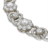 A Victorian pearl and diamond cluster necklace
