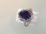 4.56 carat Royal blue D block TANZANITE & DIAMOND RING.