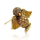 AN 18K YELLOW GOLD AND DIAMOND \"MOINEAU\" CLIP BROOCH, BY RENE BOIVIN, 1945