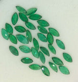 Suite of 32 loose Zambian Emeralds.