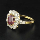 Ruby daisy ring with oval diamonds
