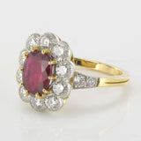Ruby daisy ring with oval diamonds