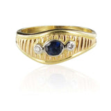 Asymmetrical diamonds sapphire ring