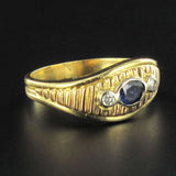 Asymmetrical diamonds sapphire ring