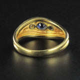 Asymmetrical diamonds sapphire ring