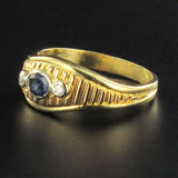 Asymmetrical diamonds sapphire ring