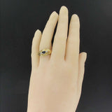 Asymmetrical diamonds sapphire ring