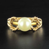 Gold twisted pearl ring