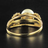 Gold twisted pearl ring