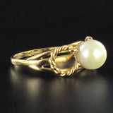 Gold twisted pearl ring