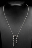 Graceful Edwardian Diamond Pendant Necklace in Luxurious Platinum
