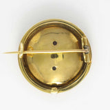 Old gold brooch and glass paste