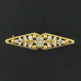 Yellow gold diamond floral pattern brooch