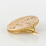 Old rose gold brooch with engravings and fine pearls