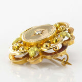 Yellow gold plant motif brooch and fine pearls