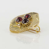 Brooch old garnets cabochons and diamonds