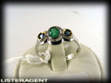 RING IN 18KT WHITE GOLD WITH SAPPHIRES AND EMERALD SIZE 15 REF. AN991C