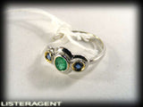 RING IN 18KT WHITE GOLD WITH SAPPHIRES AND EMERALD SIZE 15 REF. AN991C