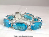 BRACELET IN 925 SILVER AND LIGHT BLUE TOPAZES