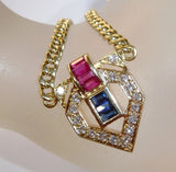 Necklace made of solid 14 kt / 585 gold with 1.35 ct ruby and sapphire baguette + 17 diamonds approx. 0.45 ct in total.