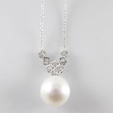 18 kt white gold necklace with 0.64 ct diamond and a fresh water pearl of 14 mm, length 44 cm