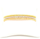 Lot of 3 semi-rigid bracelets in rose, white and yellow gold, with faceted beads, diameter 6 cm, weight 22.40 g