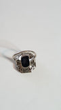Antique ring in platinum, sapphire and diamond entourage