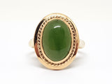 18K yellow gold cocktail ring with a cabochon cut Jade-Nephrite,total: 6,10 ct.