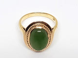 18K yellow gold cocktail ring with a cabochon cut Jade-Nephrite,total: 6,10 ct.