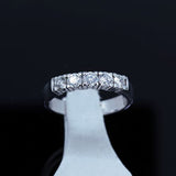 half eternity ring made of gold with diamonds