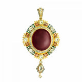 An important Holbeinesque garnet and enamel pendant