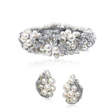 A PEARL AND DIAMOND BRACELET AND EARRINGS