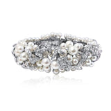A PEARL AND DIAMOND BRACELET AND EARRINGS