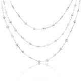A DIAMOND, CULTURED PEARL AND PLATINUM NECKLACE