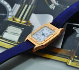 Cartier, Lady's Ultra-thin "Santos Dumont" mech manual winding in 18KYG