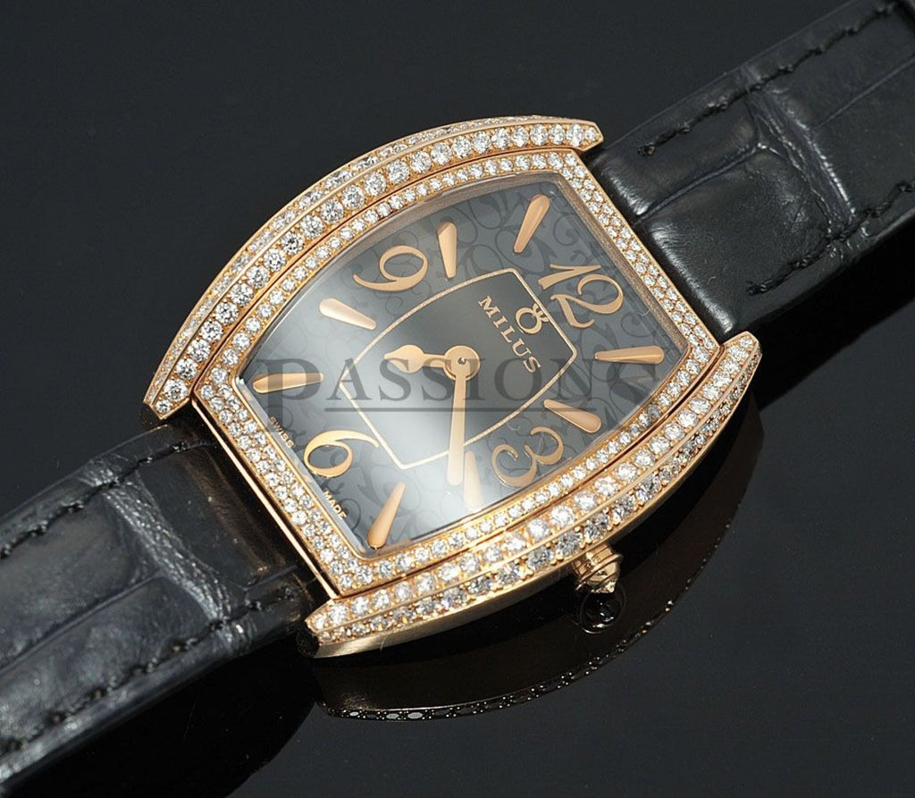 Milus, lady's "Cirina Joaillerie" Tonneau in 18KPG with 1.88 carats Diamonds