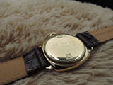 1937 ROLEX OYSTER 9K YELLOW GOLD CUSHION CASE WITH YELLOWISH ARABIC DIAL