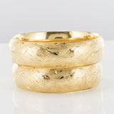 Pair of chunky bangles in chiseled gold