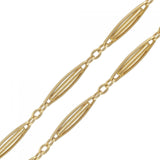 Long necklace in gold elongated mesh