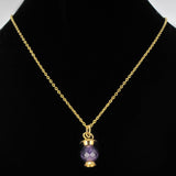 Faceted Amethyst Pendant and Gold Lantern