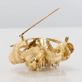 Vintage gold brooch with diamonds