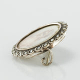 Miniature old brooch and pearls on silver