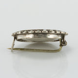 Miniature old brooch and pearls on silver