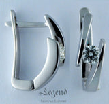 Bespoke Diamond Earrings by Legend Helsinki casted in 18k gold and platinum