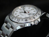 PRE OWNED MENS ROLEX STAINLESS STEEL EXPLORER II WITH A WHITE DIAL 16570