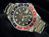 PRE OWNED MENS ROLEX STAINLESS STEEL GMT-MASTER PEPSI WITH A BLACK DIAL 16700
